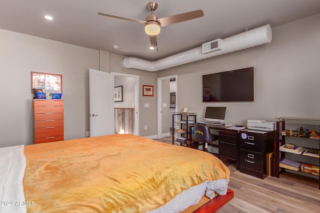 bedroom featuring ceiling fan and light hardwood / wood-style floors