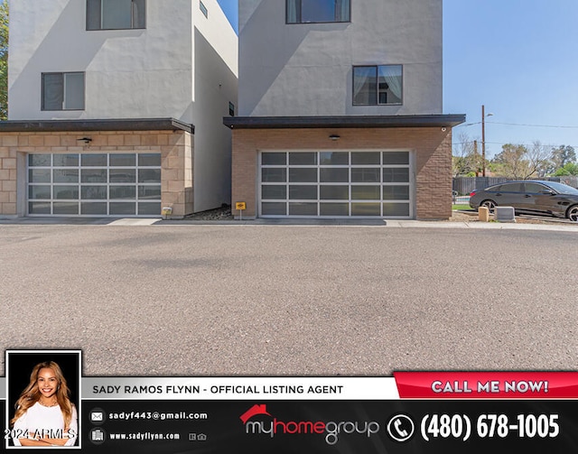 exterior space with a garage