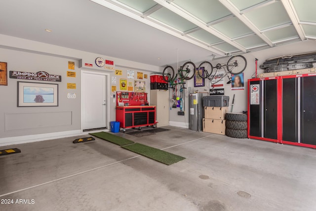 garage featuring water heater