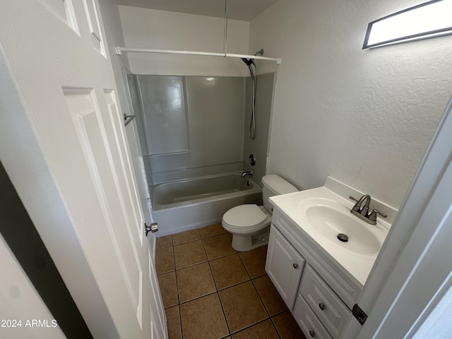 full bathroom with vanity, tile patterned floors,  shower combination, and toilet