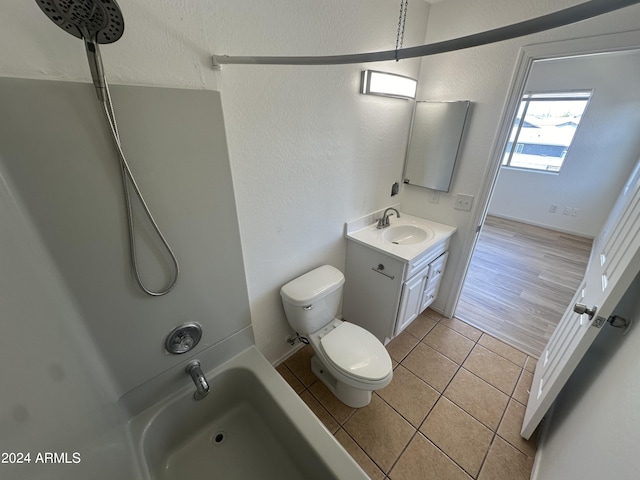 full bathroom with tile patterned flooring, vanity, shower / bathing tub combination, and toilet