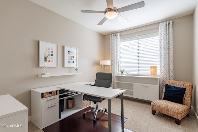 office space featuring light hardwood / wood-style flooring and ceiling fan