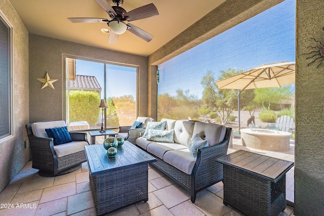 view of patio / terrace featuring an outdoor living space and ceiling fan