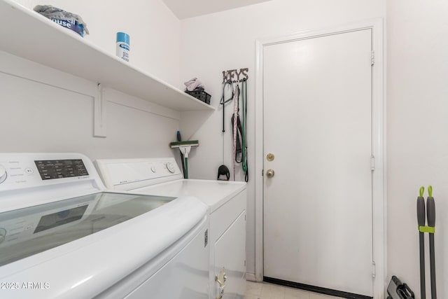 laundry room featuring laundry area and separate washer and dryer