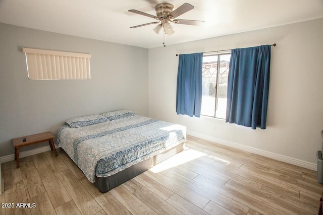 bedroom featuring light hardwood / wood-style flooring and ceiling fan