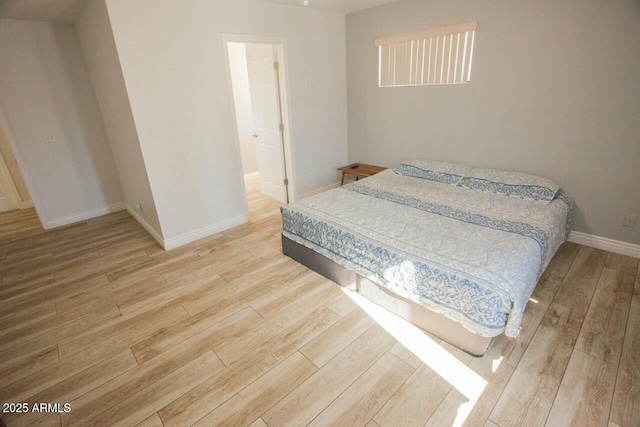 bedroom featuring light wood-type flooring