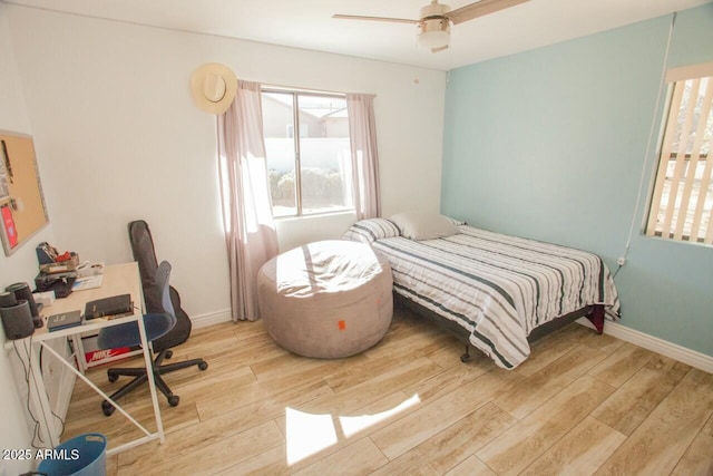 bedroom featuring ceiling fan and light hardwood / wood-style flooring