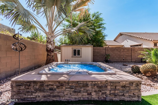 view of swimming pool with a storage shed