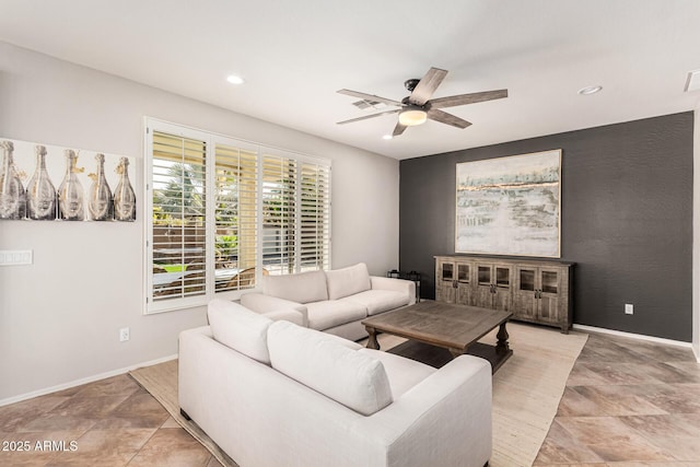 living room with ceiling fan