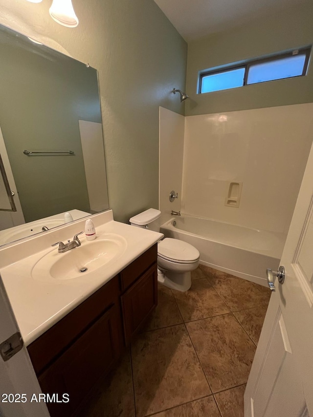 full bath featuring vanity, tile patterned flooring, bathtub / shower combination, and toilet