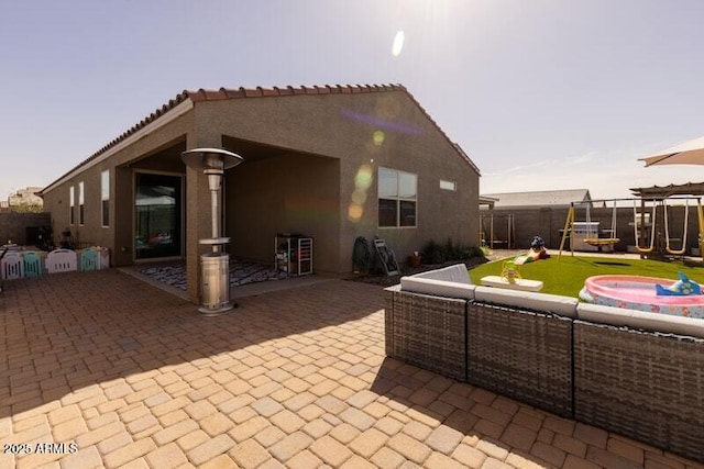 view of patio featuring fence