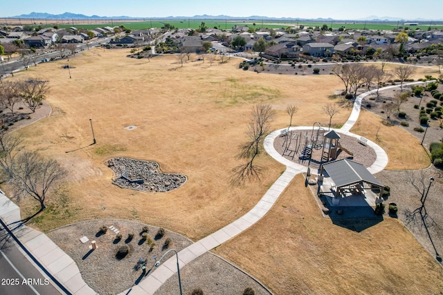 drone / aerial view featuring a mountain view