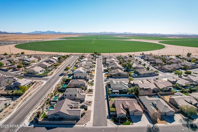 birds eye view of property featuring a mountain view