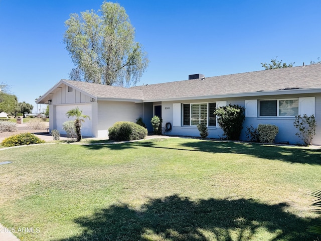 8343 E Edward Ave, Scottsdale, AZ 85250 - ranch-style home featuring a garage, a front yard, board and batten siding, and a shingled roof