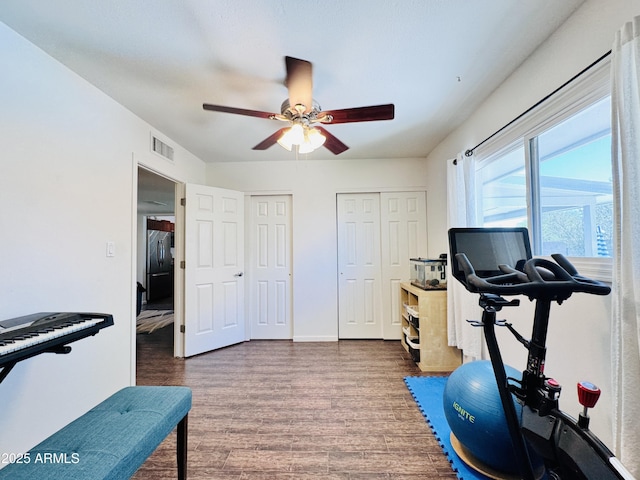 8343 E Edward Ave, Scottsdale, AZ 85250 - exercise area featuring wood finished floors and ceiling fan