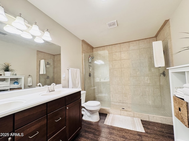 8343 E Edward Ave, Scottsdale, AZ 85250 - full bath with wood finished floors, double vanity, and tiled shower