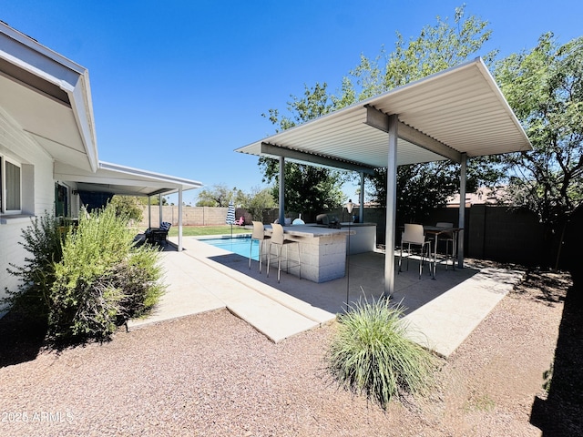 8343 E Edward Ave, Scottsdale, AZ 85250 - fenced backyard with a patio area and an outdoor kitchen
