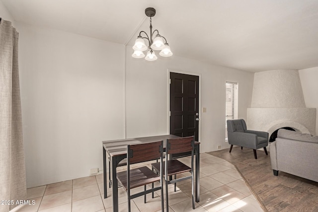 8841 S 48th St Unit 1, Phoenix, AZ 85044 - dining area with a chandelier and light tile patterned flooring