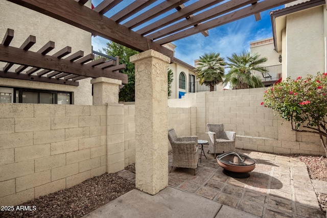 8841 S 48th St Unit 1, Phoenix, AZ 85044 - view of patio / terrace with a fire pit and a pergola