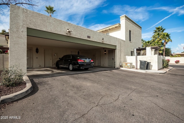8841 S 48th St Unit 1, Phoenix, AZ 85044 - view of side of home featuring stucco siding