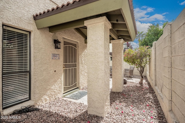 8841 S 48th St Unit 1, Phoenix, AZ 85044 - doorway to property featuring stucco siding