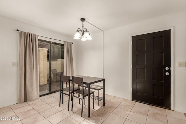8841 S 48th St Unit 1, Phoenix, AZ 85044 - dining room with a chandelier and light tile patterned floors