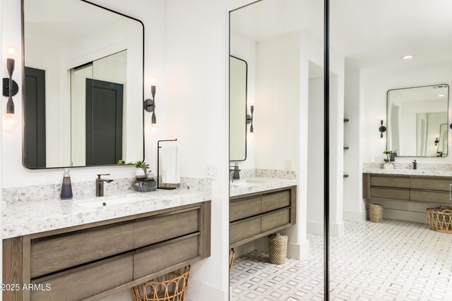 6438 E Montreal Pl, Scottsdale, AZ 85254 - bathroom with a sink, two vanities, and recessed lighting