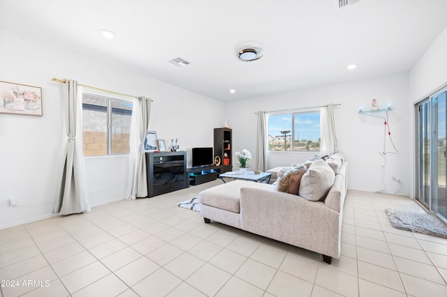 living room featuring light tile patterned floors