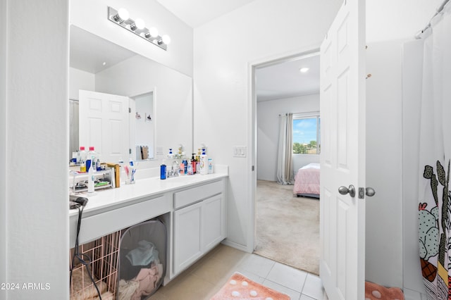 bathroom featuring vanity and tile patterned flooring