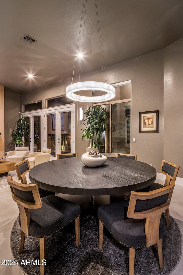 dining room featuring french doors