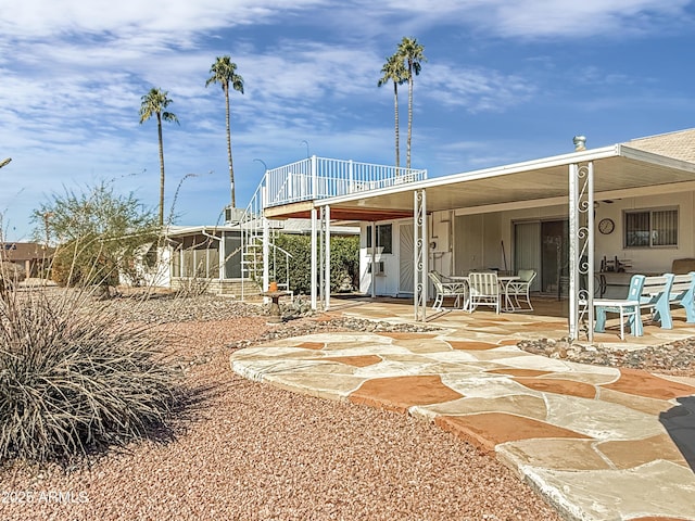 back of house with a patio area