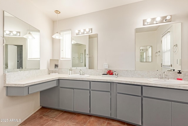 bathroom featuring tile patterned floors and vanity