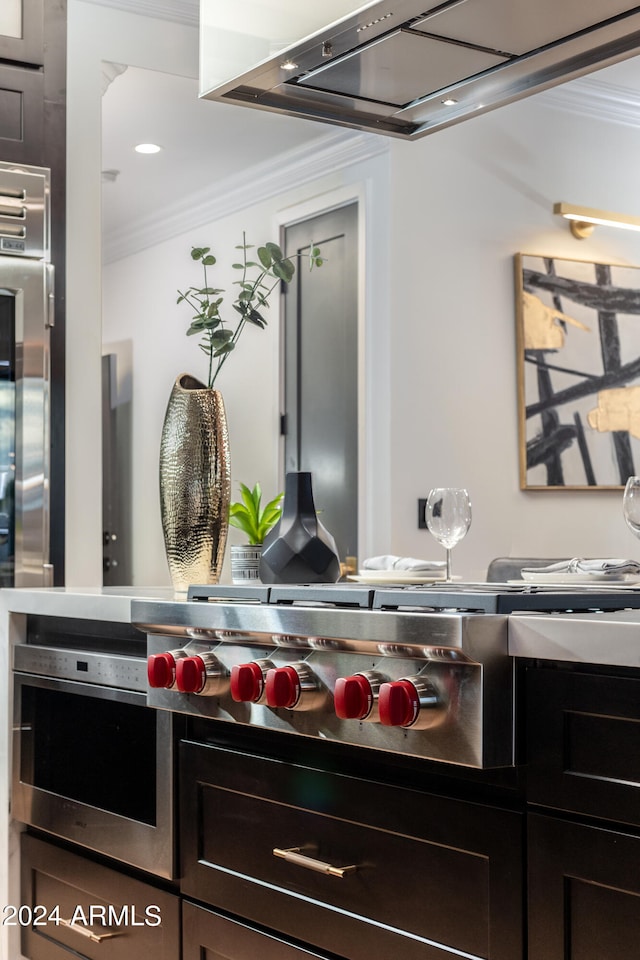 kitchen with crown molding and oven