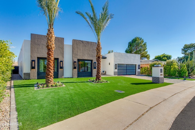 modern home with a front yard