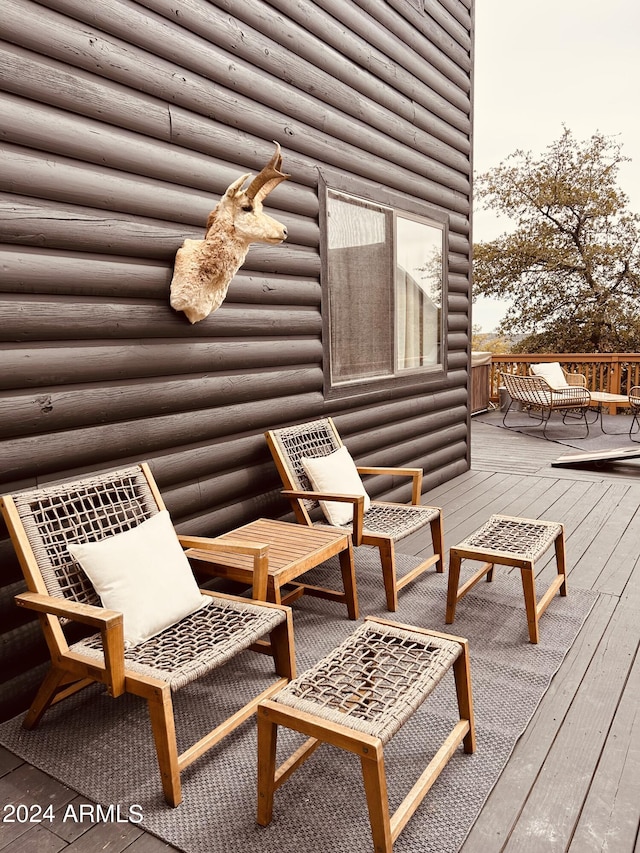 wooden balcony with a wooden deck