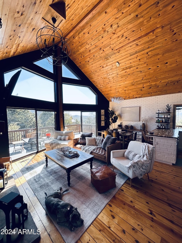 living room with high vaulted ceiling, light hardwood / wood-style floors, wood ceiling, and a notable chandelier