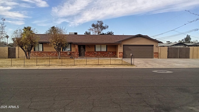 ranch-style home featuring a garage