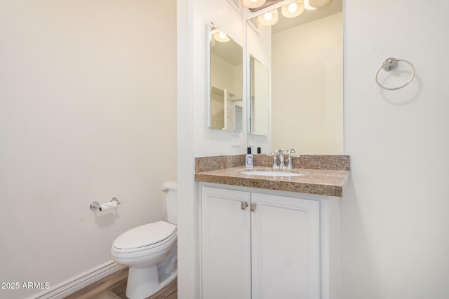 5450 E Deer Valley Dr Unit 1211, Phoenix, AZ 85054 - half bath featuring vanity and wood finished floors