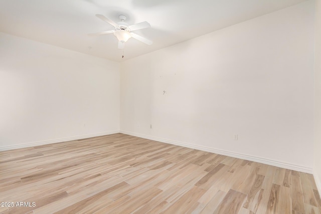5450 E Deer Valley Dr Unit 1211, Phoenix, AZ 85054 - unfurnished room featuring light wood-type flooring and ceiling fan