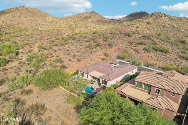 drone / aerial view featuring a mountain view