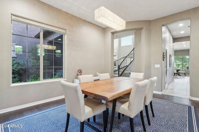 dining area with hardwood / wood-style flooring