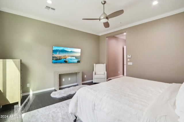 bedroom featuring ornamental molding, ceiling fan, and dark hardwood / wood-style floors