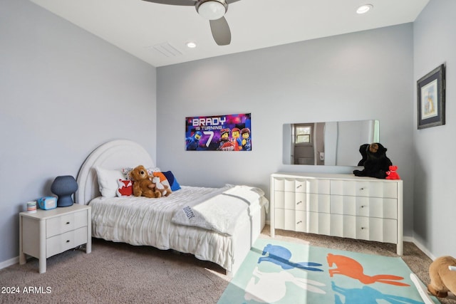 bedroom featuring ceiling fan and light colored carpet