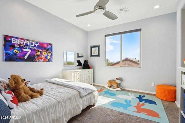 carpeted bedroom featuring ceiling fan