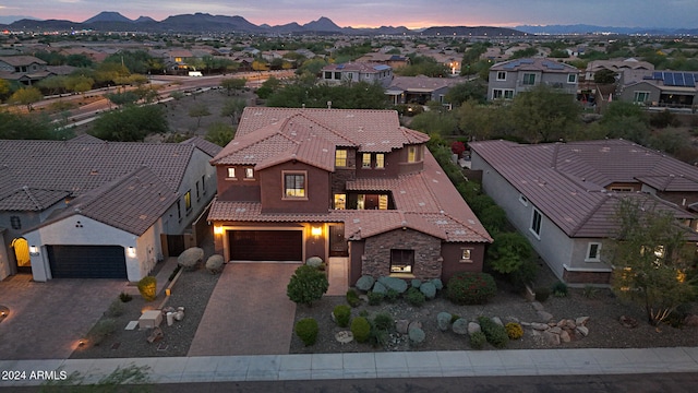 aerial view at dusk with a mountain view