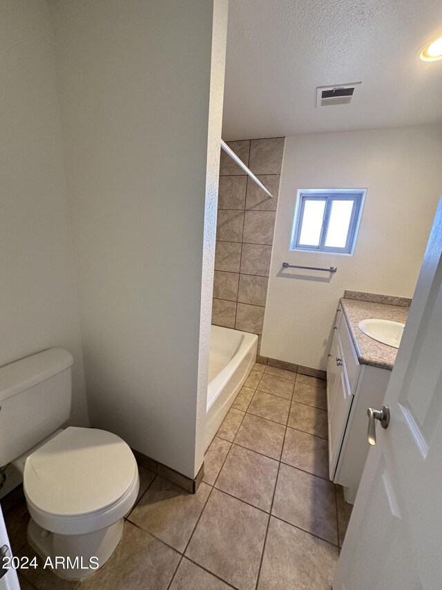 unfurnished room featuring hardwood / wood-style floors, a textured ceiling, and ceiling fan