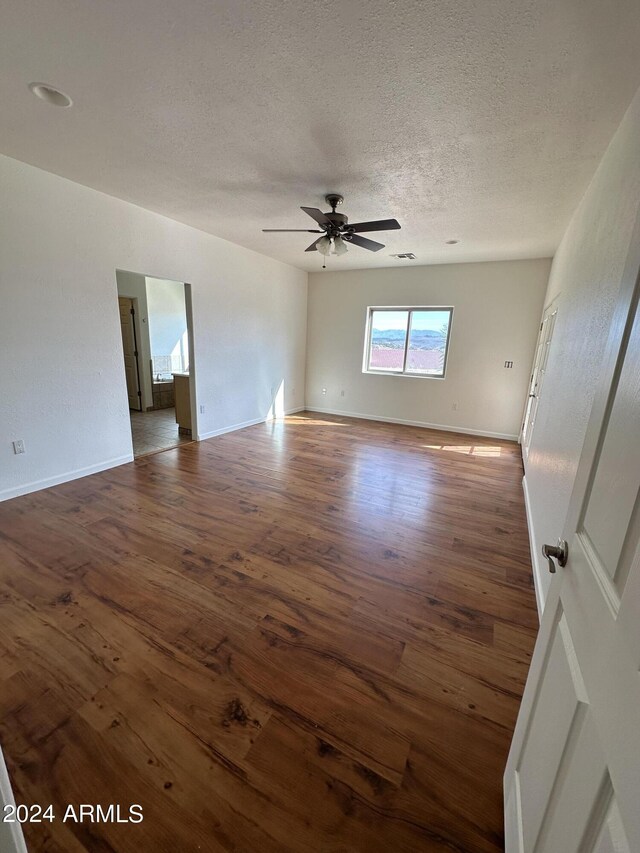 spacious closet featuring hardwood / wood-style floors