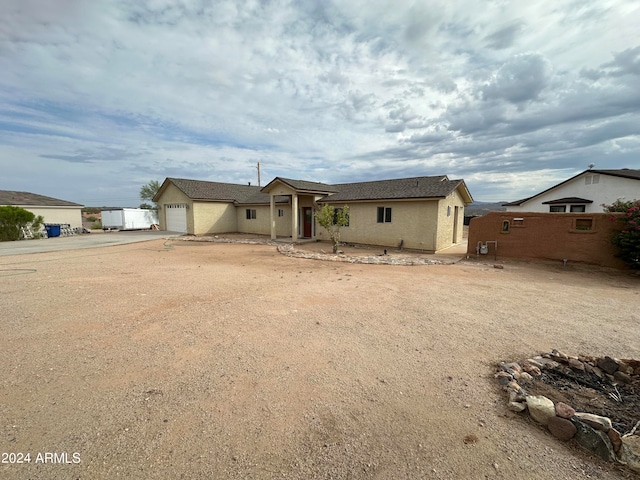 ranch-style home with a garage