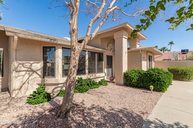 exterior space with stucco siding