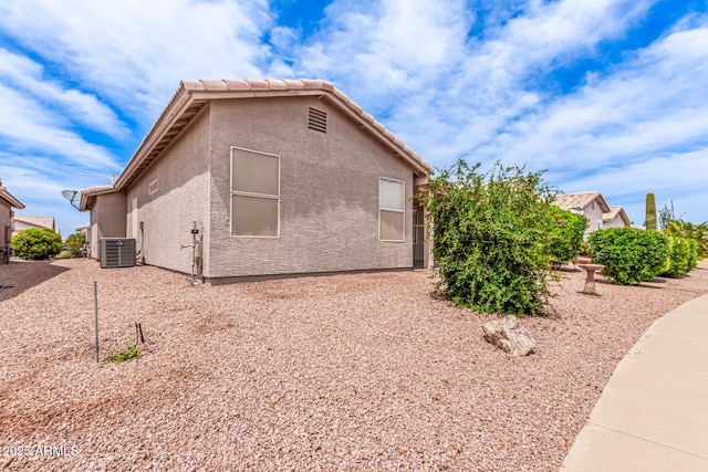 1395 E Runaway Bay Dr, Chandler, AZ 85249 - view of home's exterior with central air condition unit and stucco siding